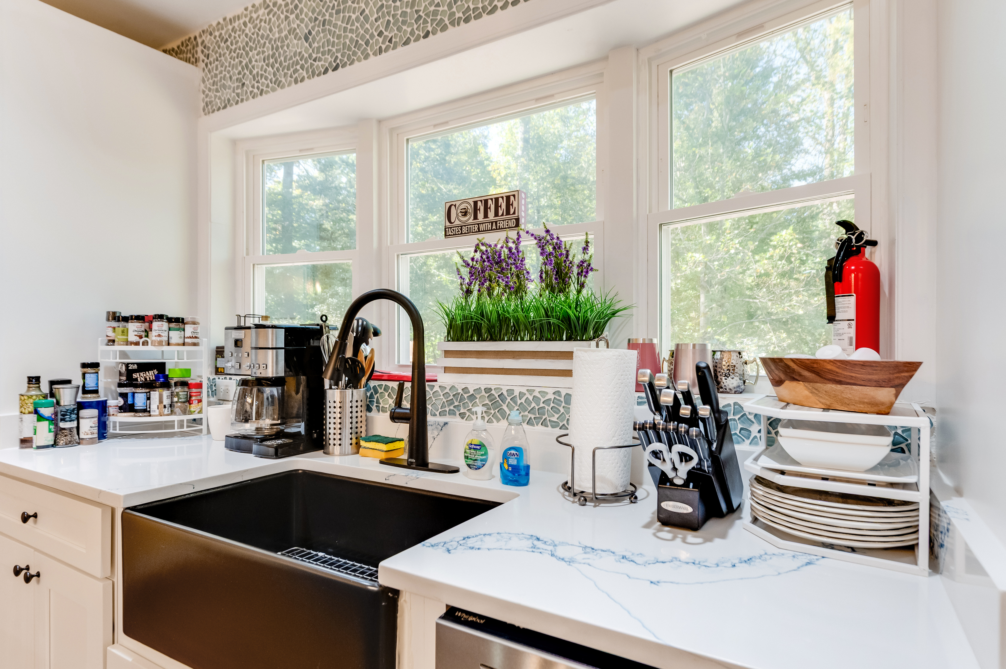 Fully Stocked Kitchen: Enjoy culinary adventures with gleaming quartz counters and serene views!
