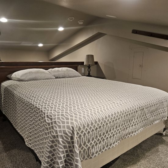 Loft area: Full-size bed.