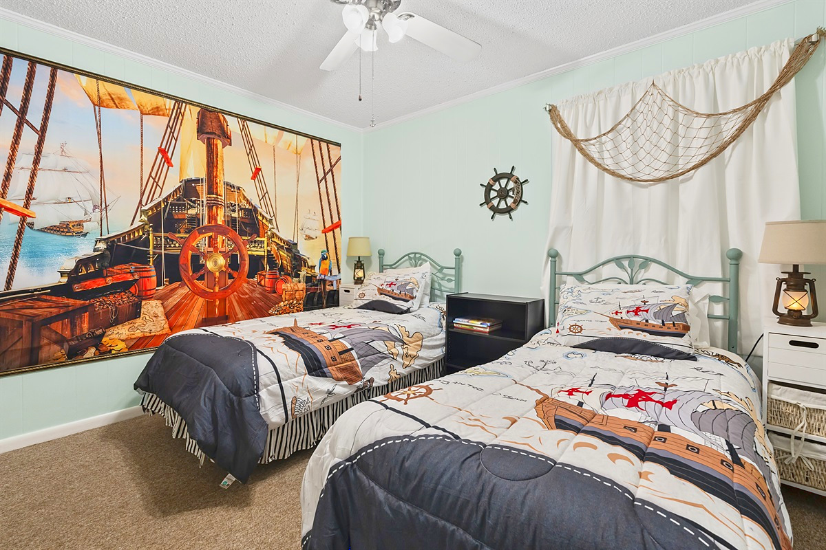 Second Bedroom – Two twin beds with a pirate ship mural