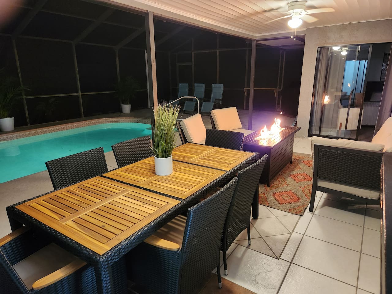 Outdoor pool area with plenty of seating to enjoy your meals outside. 