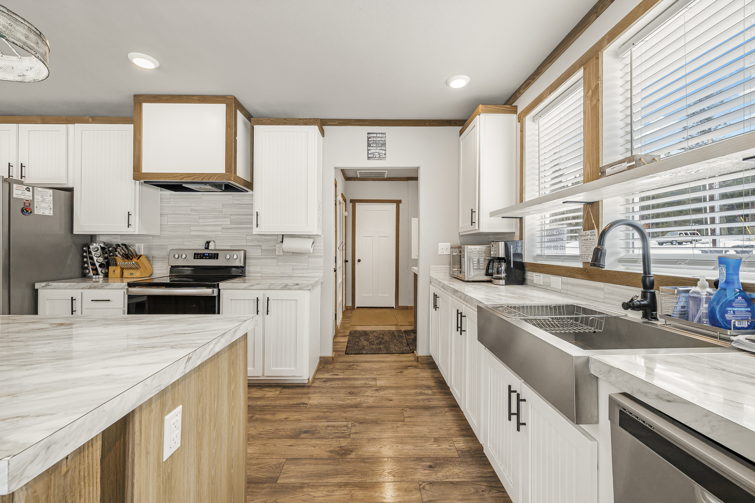 Kitchen and entry way in the background 