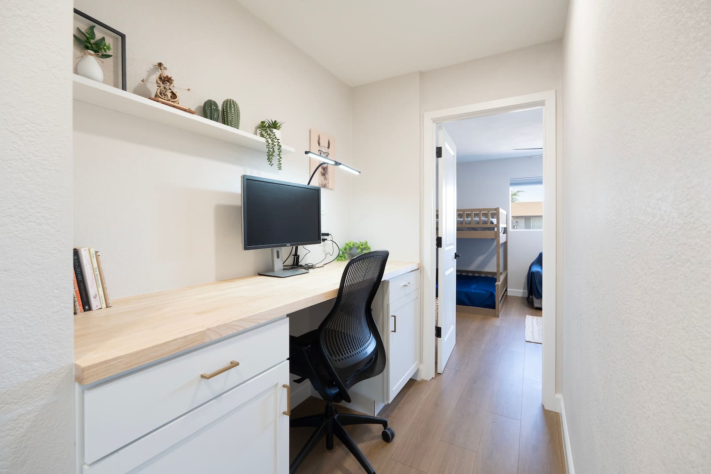 Dedicated workspace with desk, monitor, and high-speed WiFi—perfect for remote work.