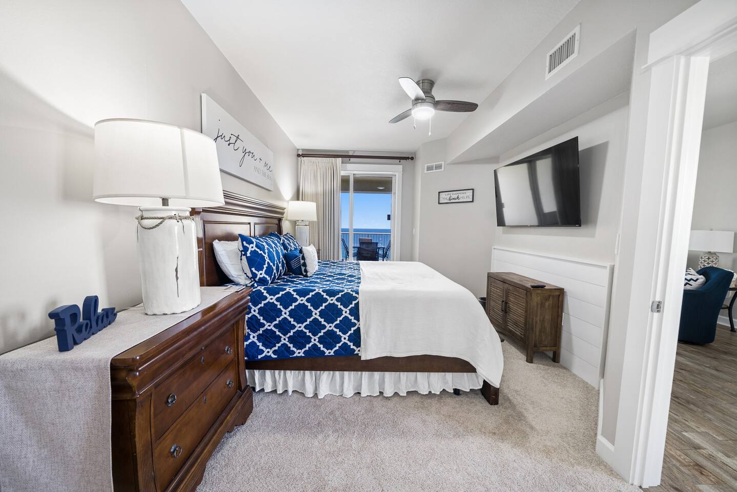 Wake up in our master bedroom to a beautiful view of the ocean with your own entrance to the patio! 
