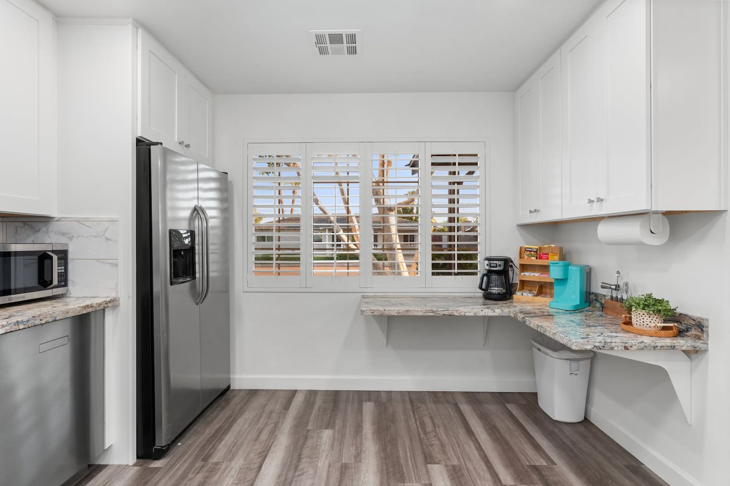Enjoy your favorite brew at the dedicated coffee station, equipped with Keurig, drip coffee maker, and essentials.

