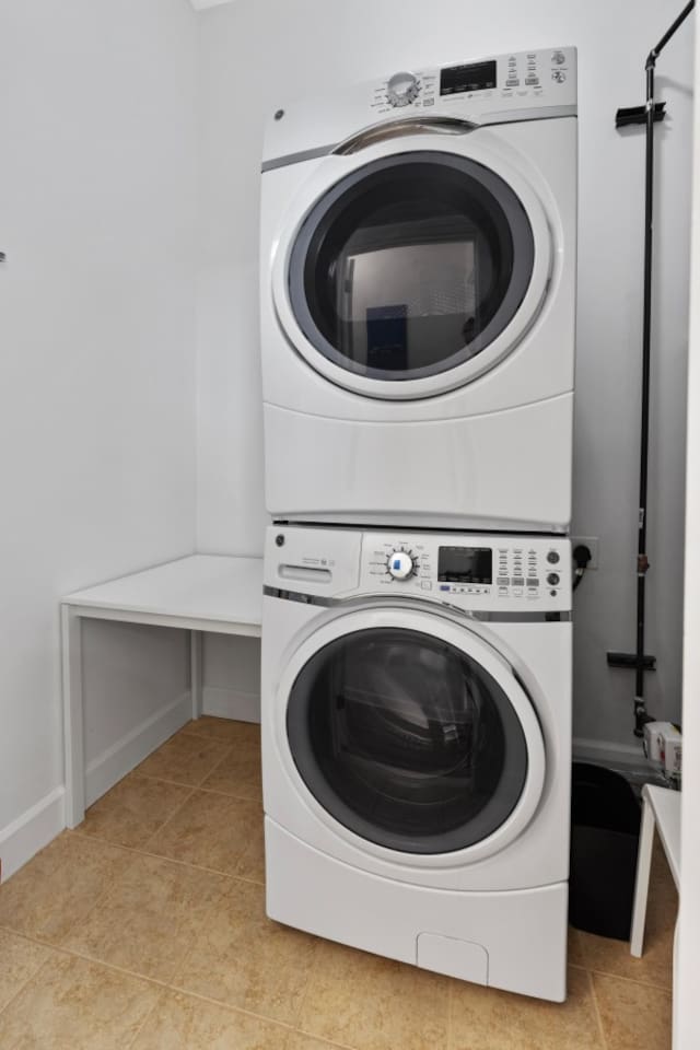 Convenient full-sized front-loading washer tucked away in the utility closet.
