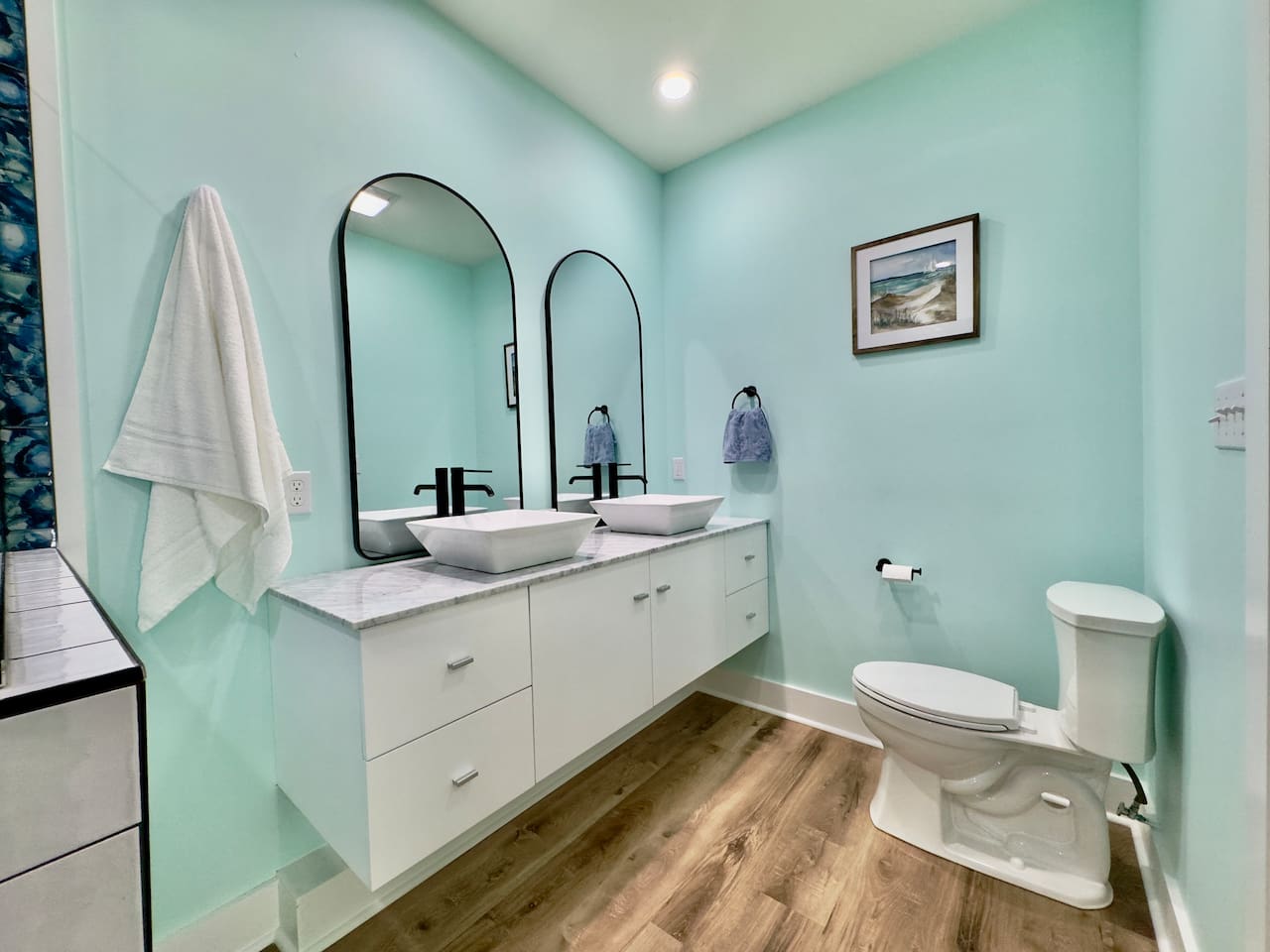 Welcome to our spacious bath with double vanities and style.