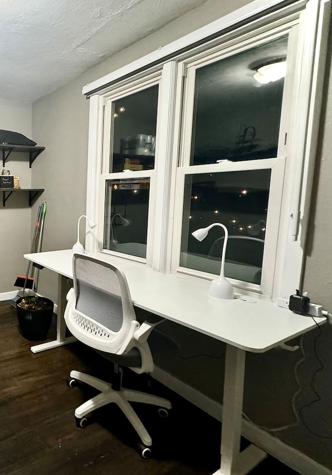 The Main Level Office and Mud Room accessible from both the Side Exterior Entrance and Dining Room offers lots of storage and an electric standing desk for your remote working needs. 