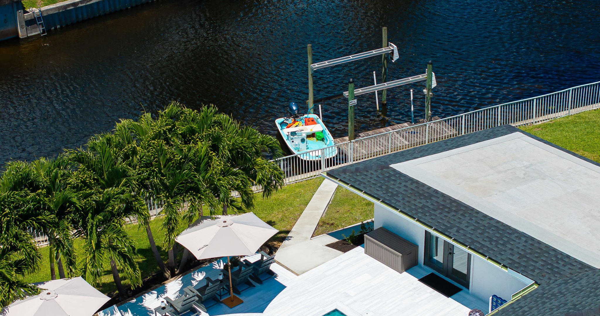 Enjoy your own private slice of paradise with sparkling lakefront views, a private dock, and direct water access—perfect for paddleboarding, kayaking, or simply soaking in the Florida sunshine by the pool.