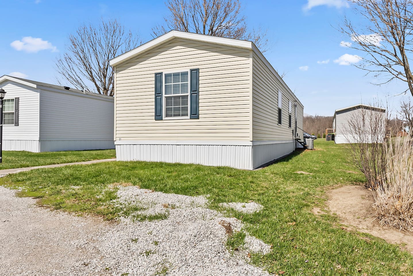 Charming single-level home with spacious outdoor surroundings and plenty of natural light.