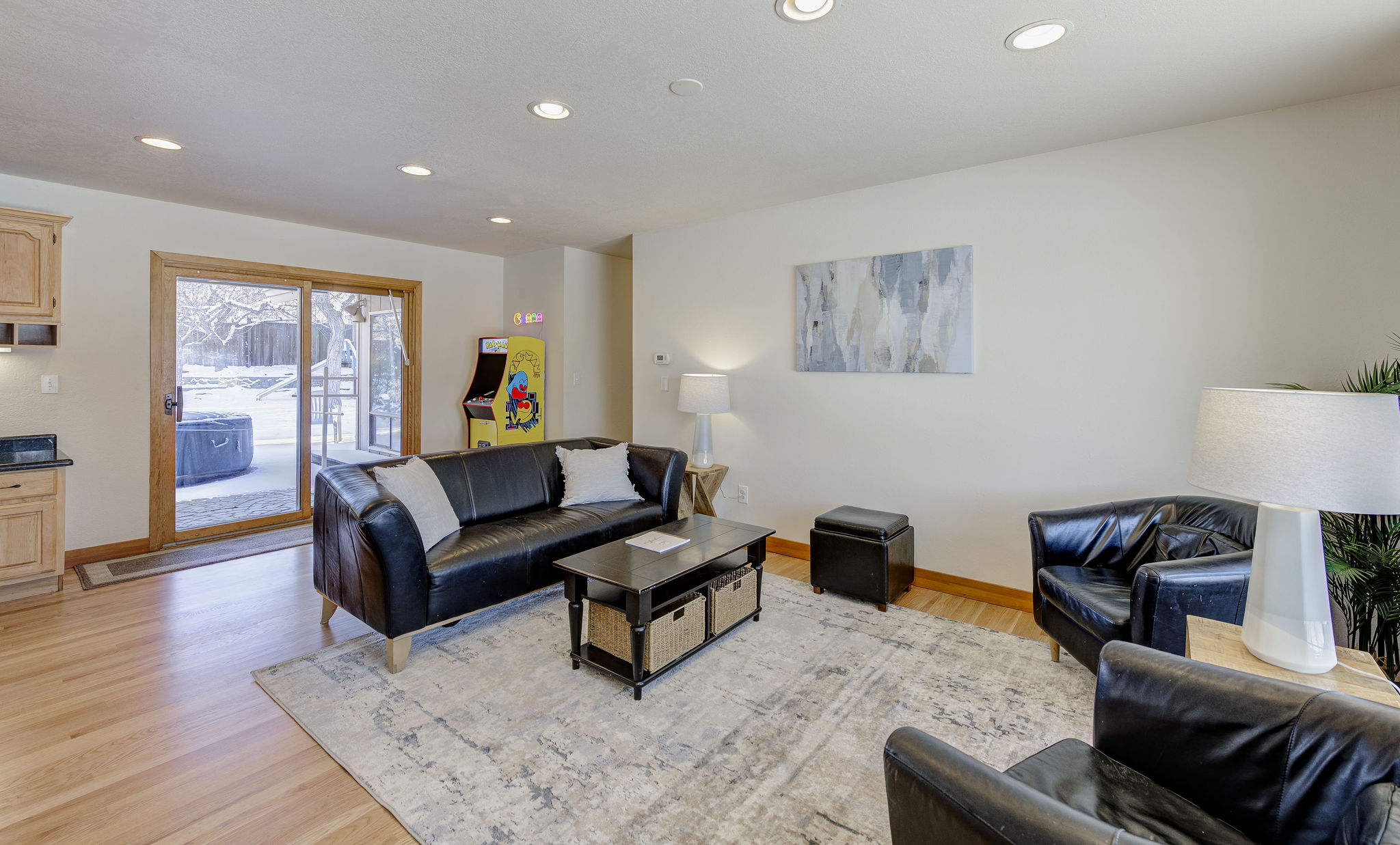 Family Room perfect for games and conversations with a PAC-Man arcade game.