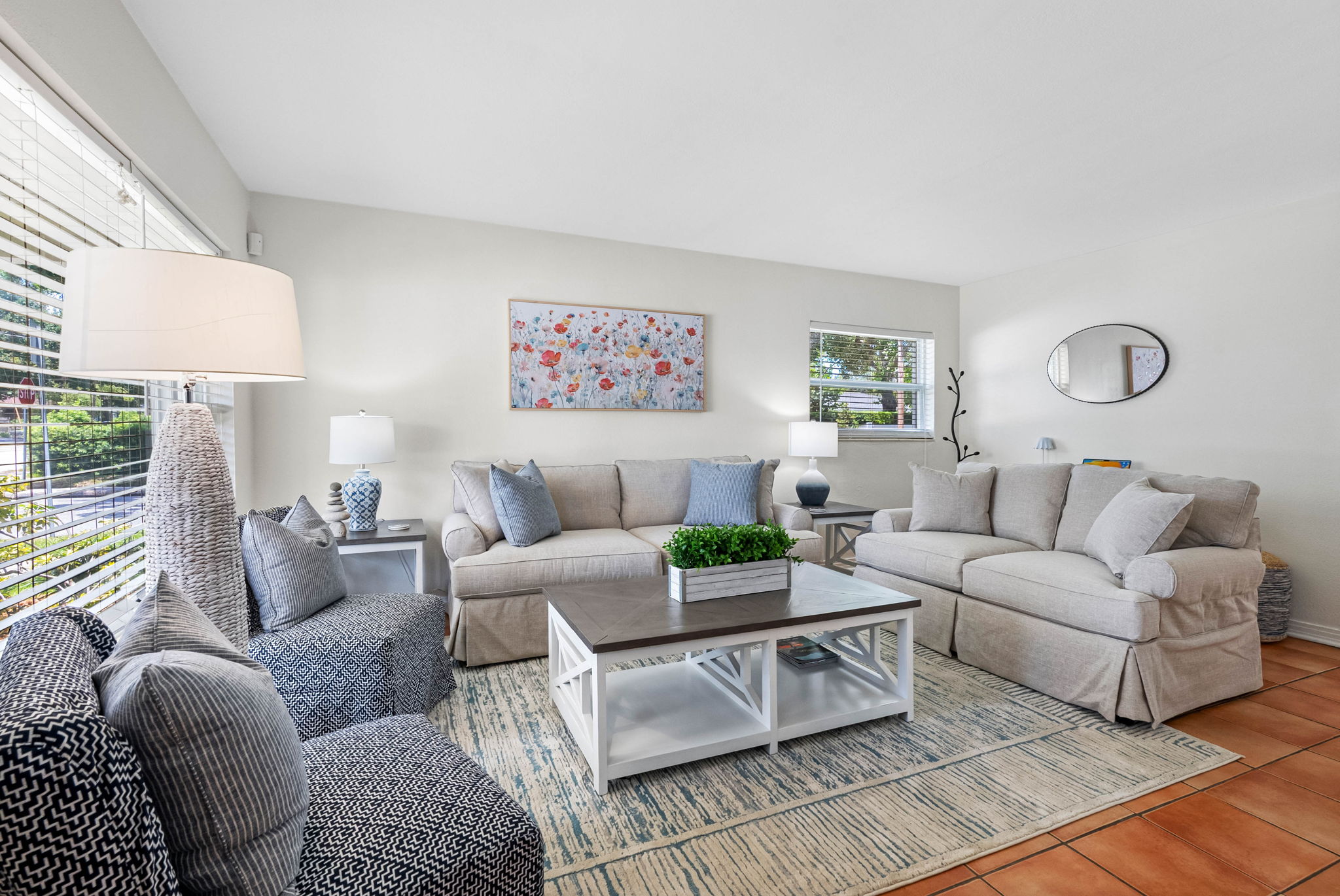 A nearby side table with additional lighting makes it easy to curl up with a book or plan your next Tampa adventure.