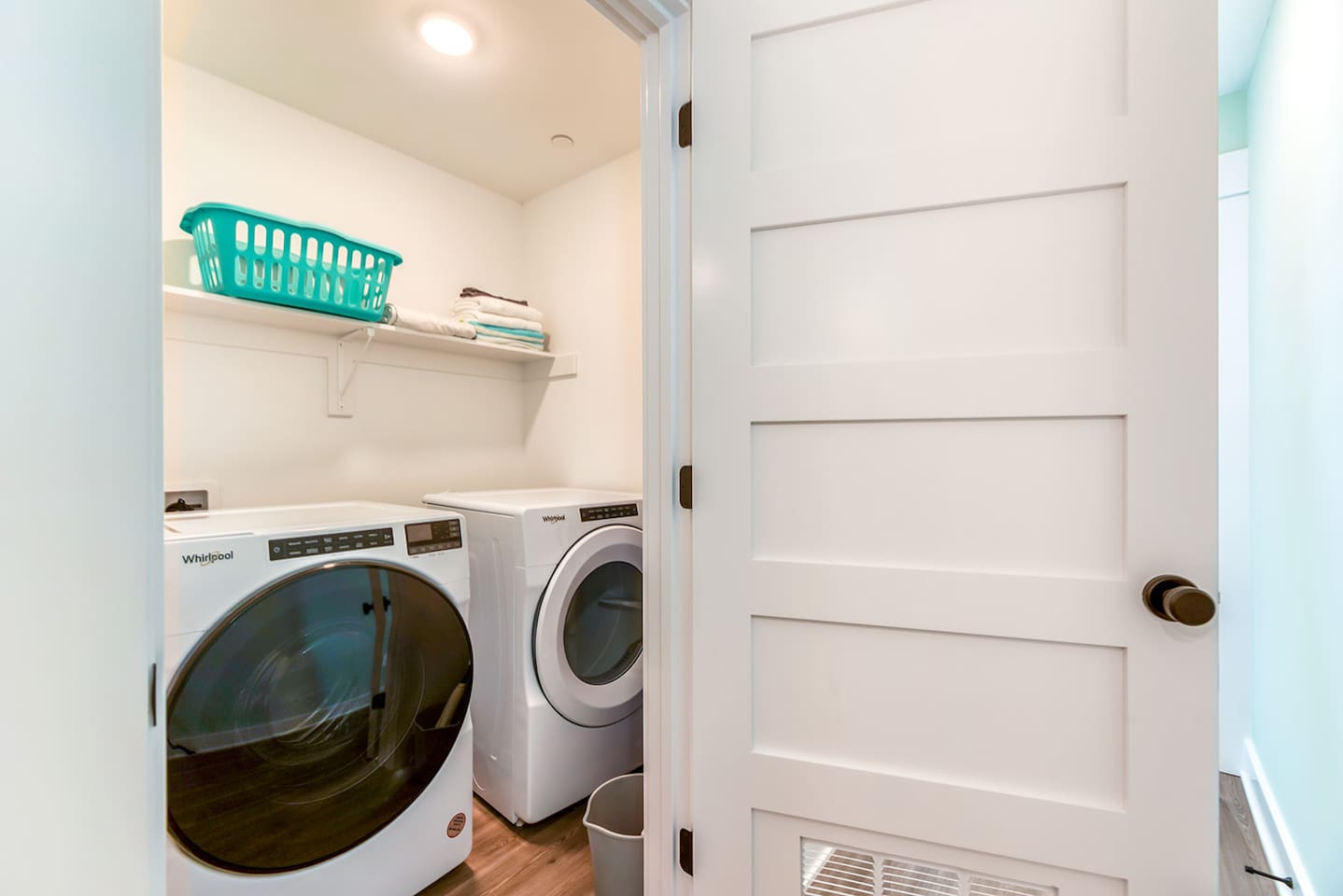Dedicated laundry area with extra storage