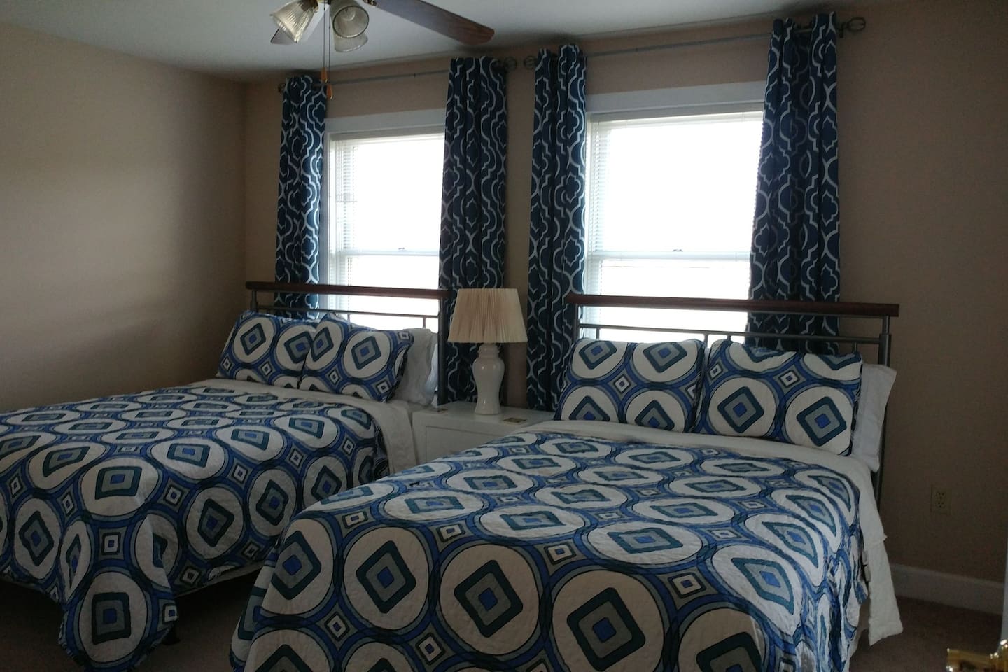 Blue room - two full beds. Brand new drapes and bedspreads.