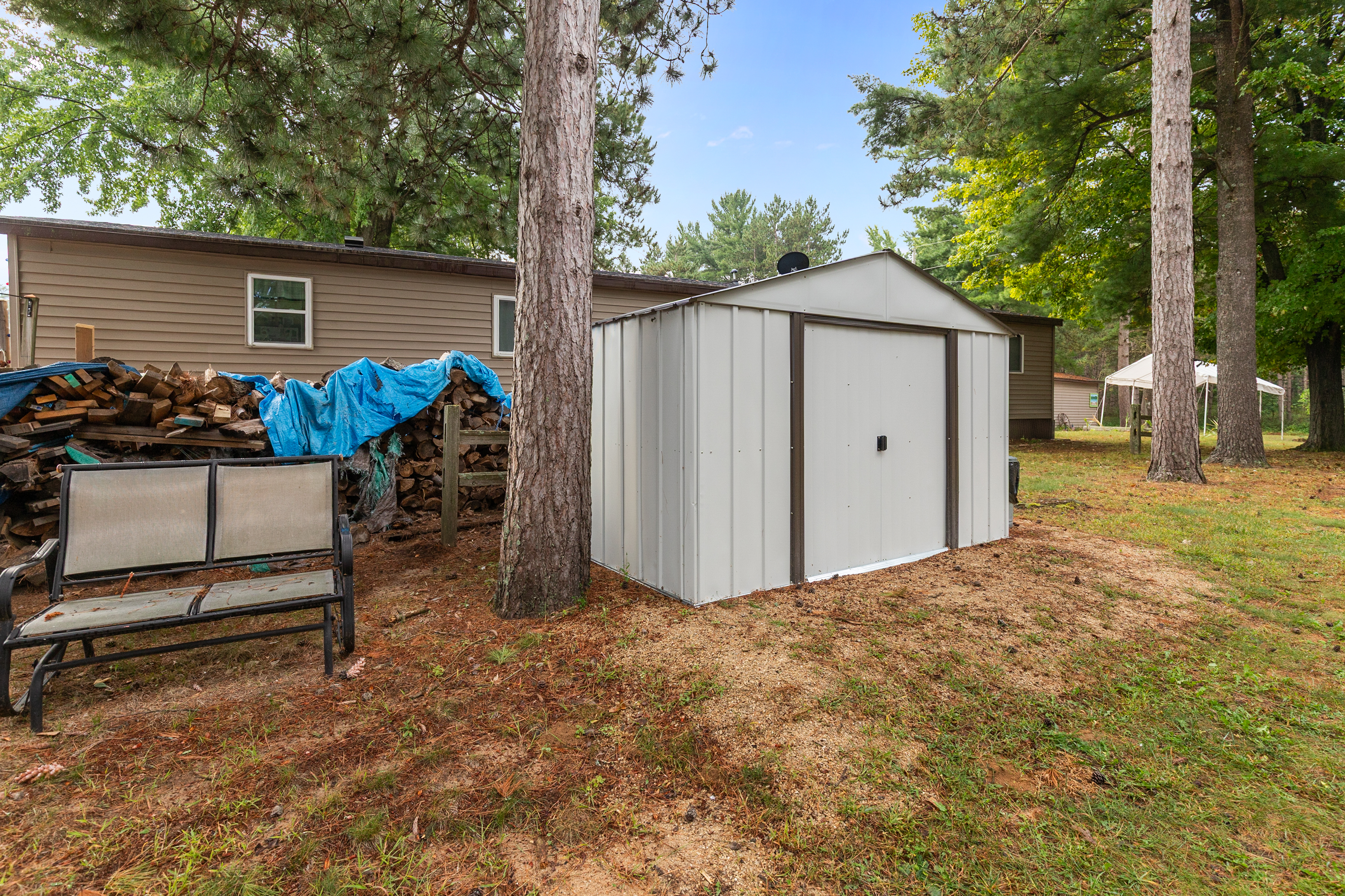 Please note: the wood pile behind the white shed belongs to the neighbors, so we kindly ask that you don’t use it