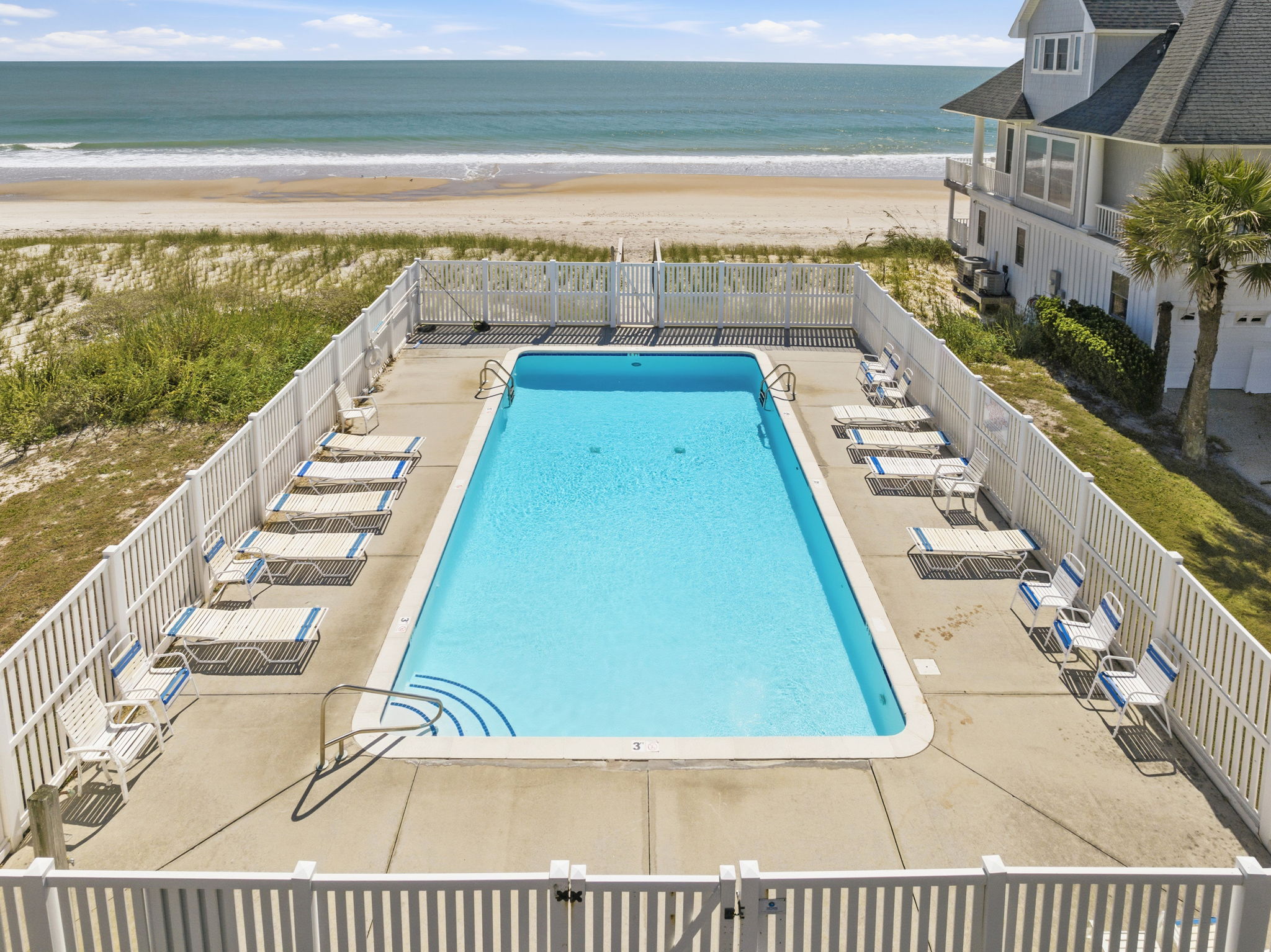 The best vacation days include a little sand, a little sunshine, and a refreshing dip in the pool.