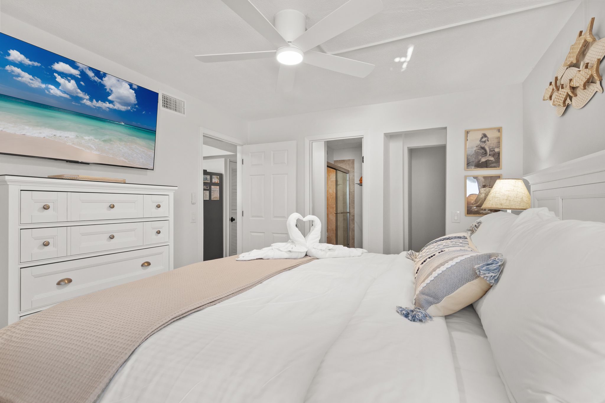 Primary suite includes a 55” Roku Smart TV—perfect for movie nights, streaming your favorites, or winding down after a day at the beach.