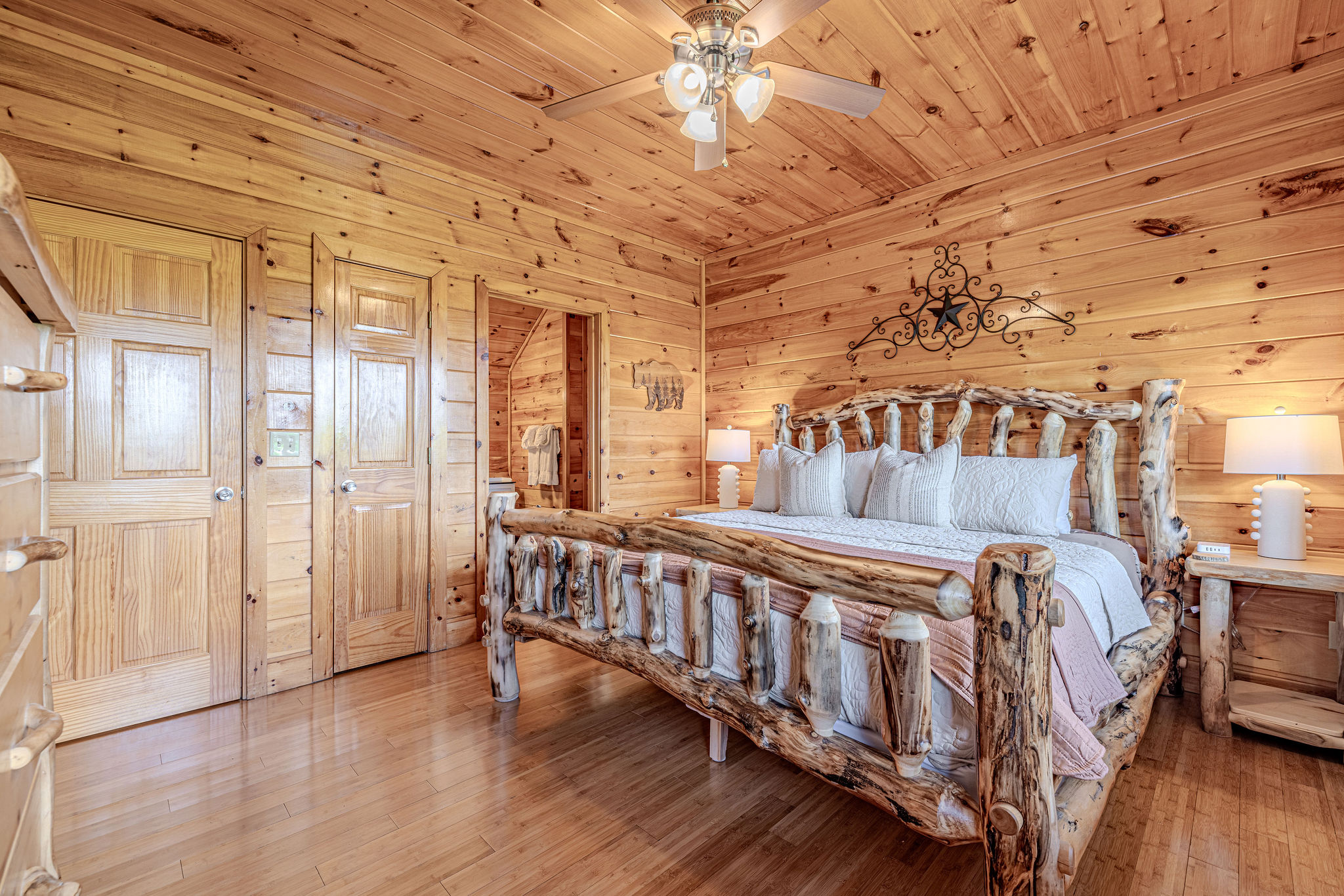 The second suite on the cool lower level features a ceiling fan, perfect for guests who desire an extra boost for a restful night's sleep.