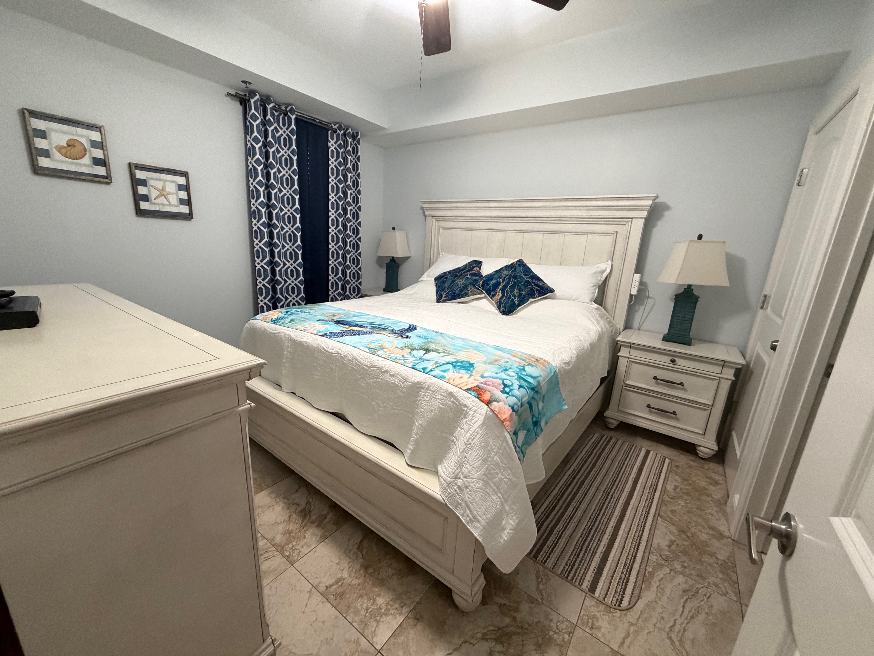 A charming guest bedroom that gives everyone their own comfortable place to recharge.