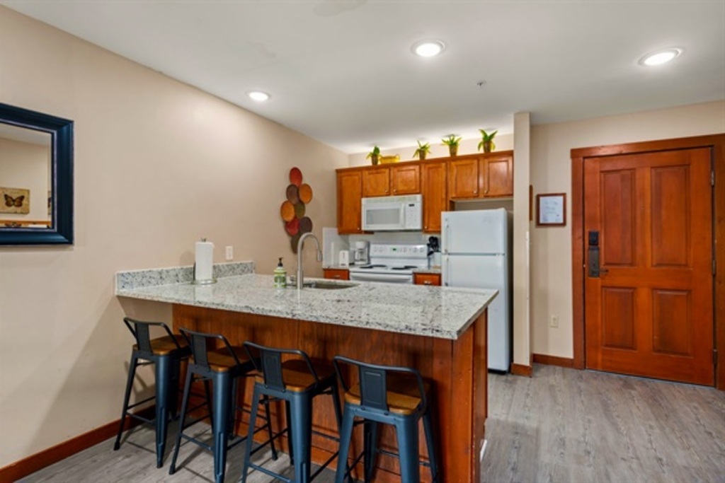 Cook up your Favorite Dishes in this Modern Kitchen.