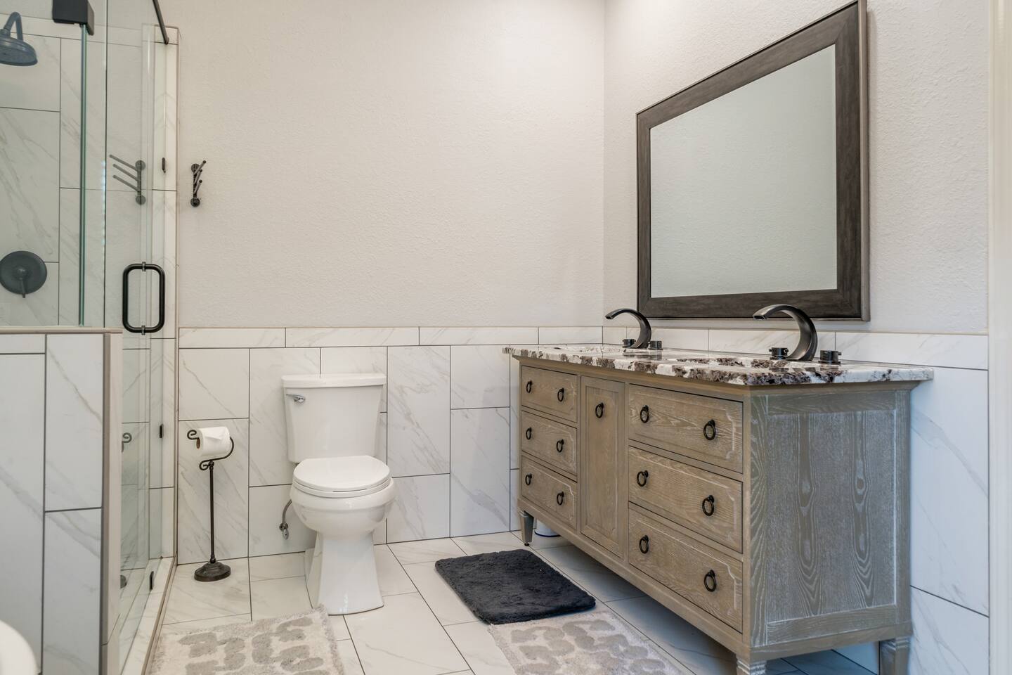 His and her sinks. Claim yours fast!  Make up cleaning towels, and extra toiletries and linens are provided in the drawers.