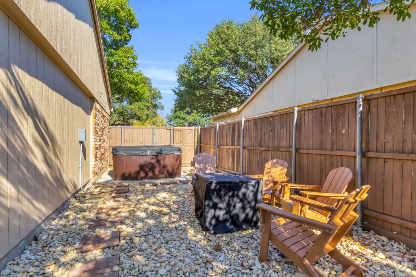 Enjoy the best of outdoor living with a private firepit and jacuzzi side by side — perfect for relaxing after exploring Grandscape or unwinding with the family. This cozy backyard setup creates the ideal day-to-night retreat in The Colony.