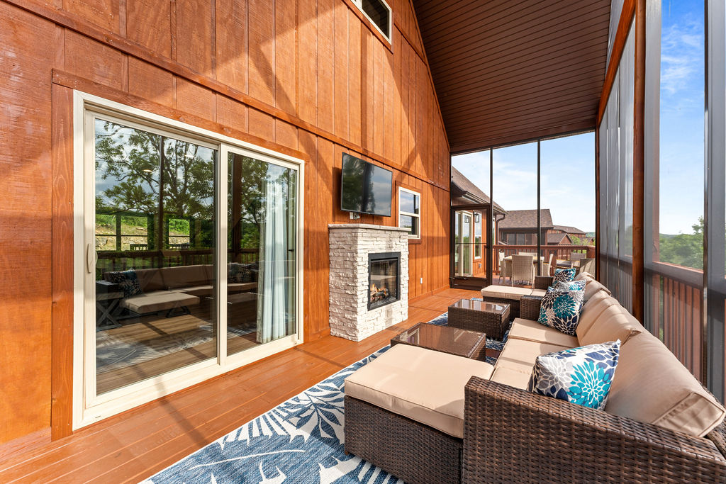 Enjoying extra seating and TV on the screened back deck!