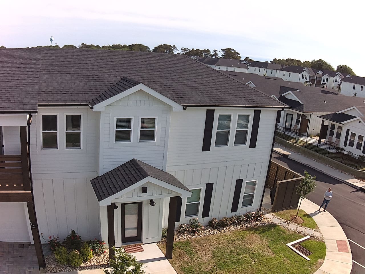 Aerial view showcasing the home and its lovely neighborhood setting
