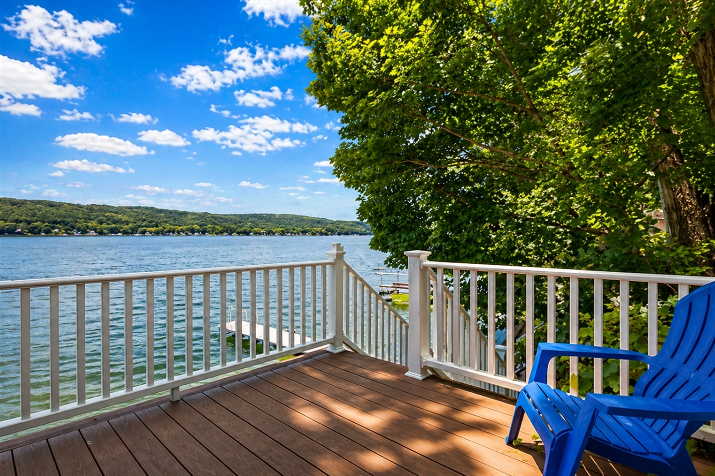 Unwind on this lakeside deck with unobstructed views of Honeoye Lake. A serene spot for morning coffee or evening cocktails. ☕️