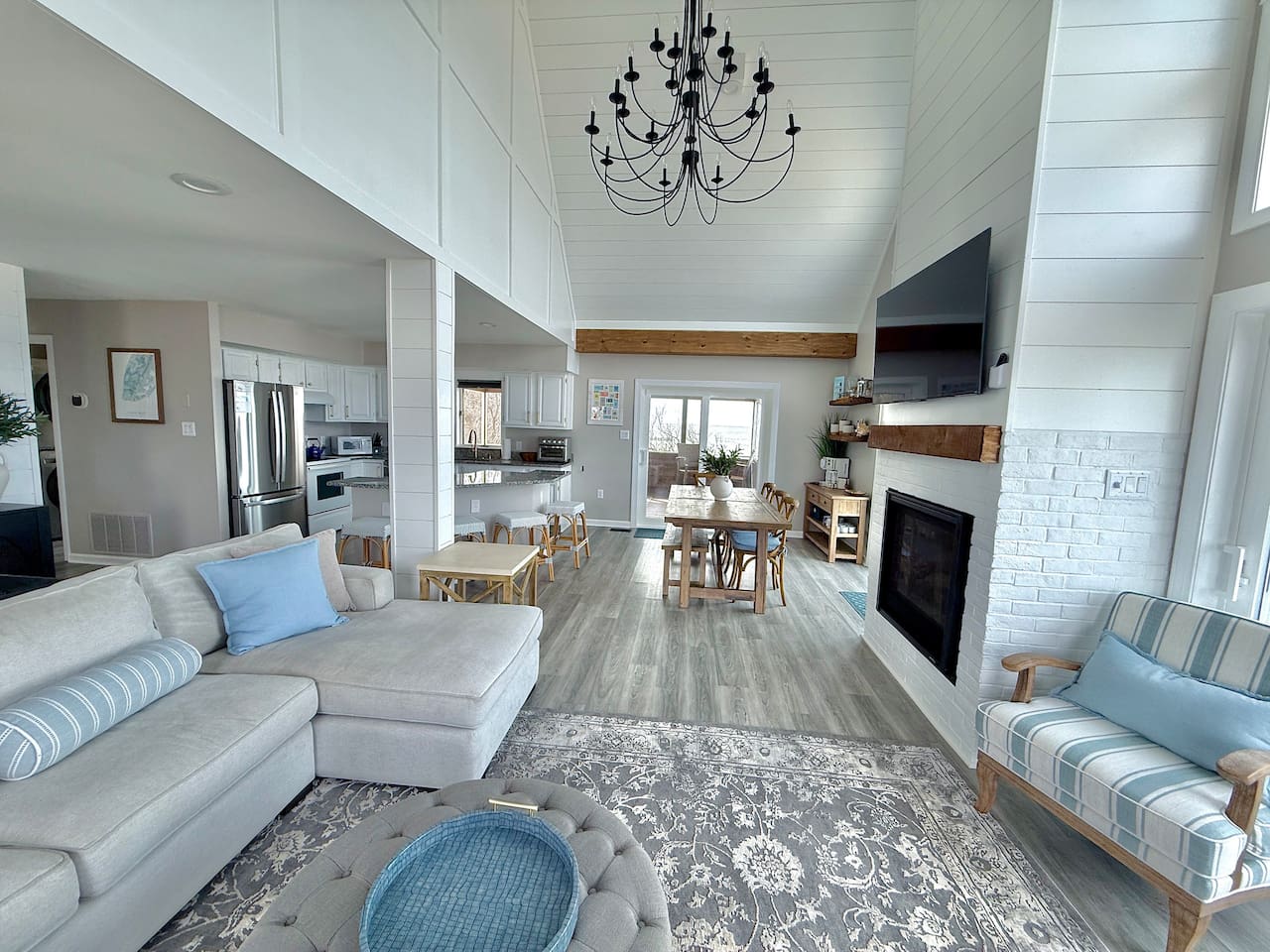 Settle into the inviting open-concept living area, where cozy seating meets a bright, airy design. It is the perfect, relaxed retreat for family and friends to gather, unwind, and cherish every moment of their dream vacation together.