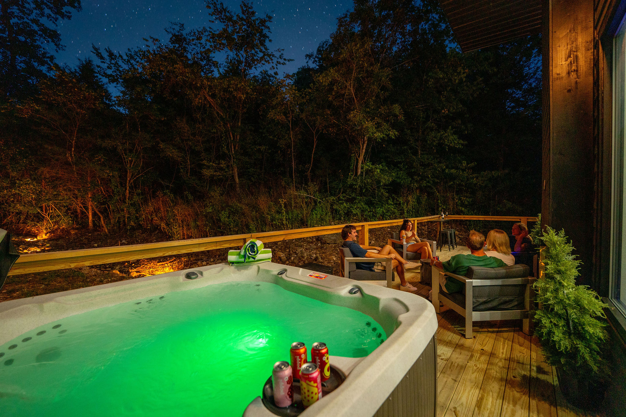 Soak beneath the trees in your private hot tub, available to enjoy year-round.
