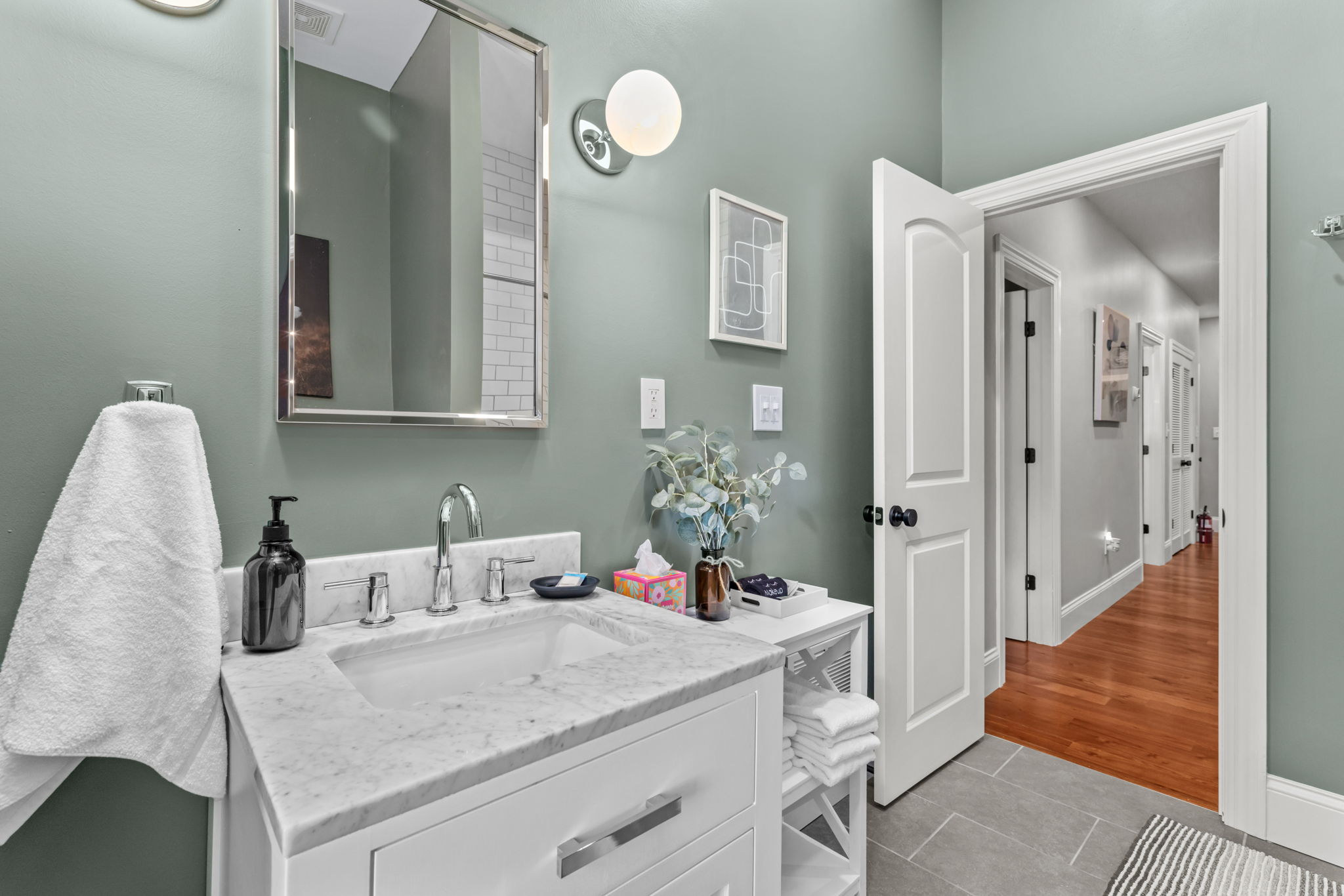 Shared bathroom conveniently located at the end of the hall on the second level.