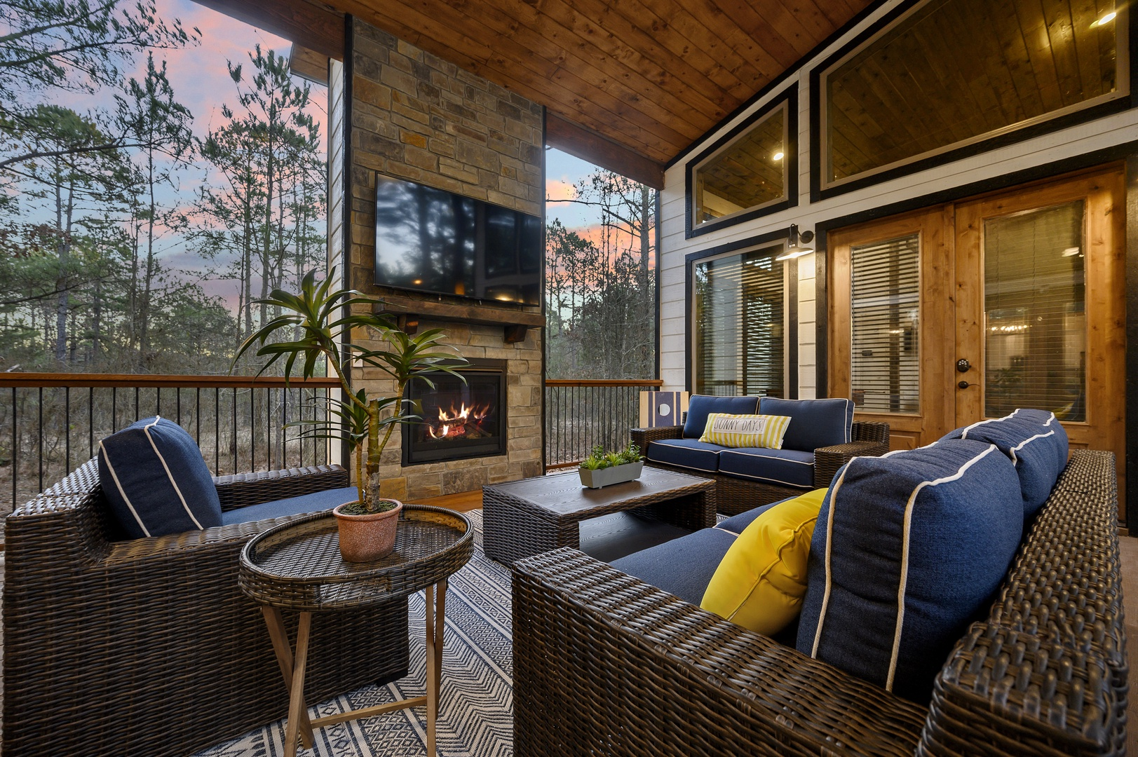 Golden hour perfection Cozy up by the outdoor fireplace and let the forest views steal the show.