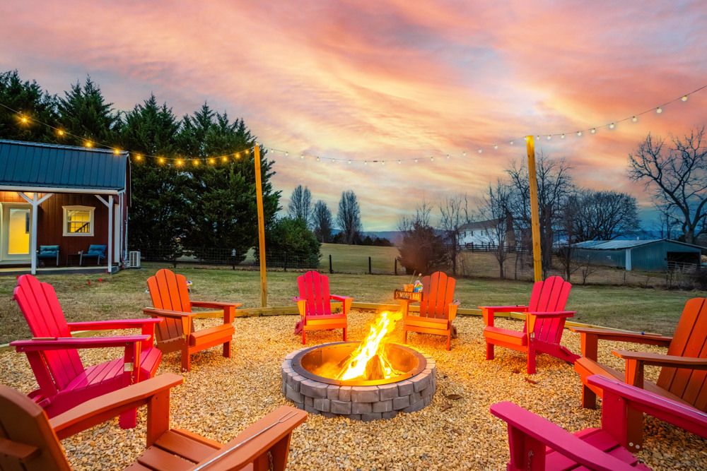 Relax around the firepit with Adirondack seating, mountain views, and unforgettable sunsets.