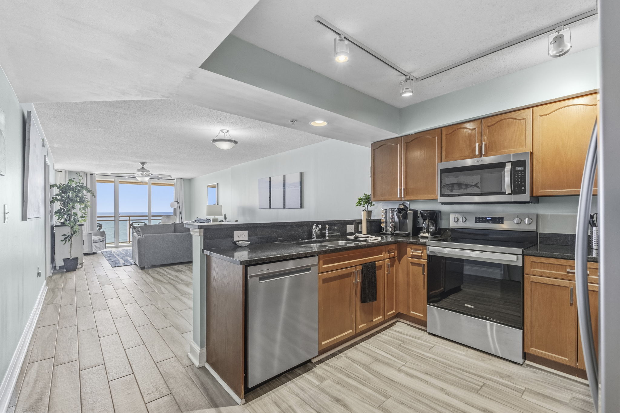 Beautiful Living Room and Kitchen with direct ocean views 