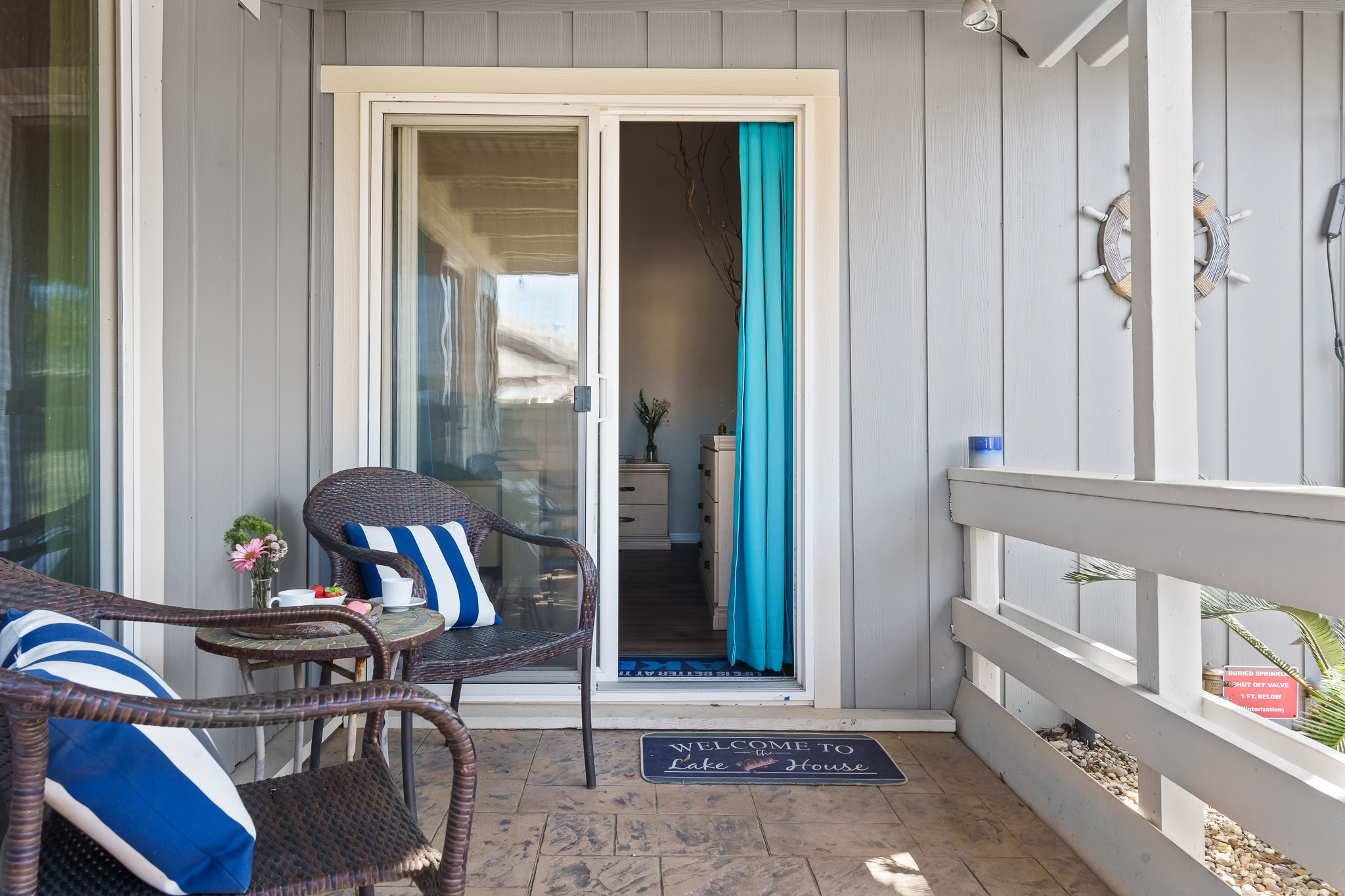 Unwind just steps from your room in this inviting patio nook—perfect for an afternoon refreshment, a sweet treat, or simply soaking in the peaceful charm of lakeside living.