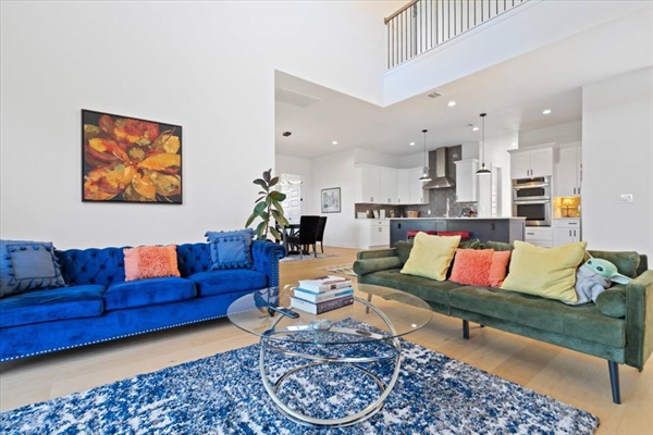 spacious living room with mountain view