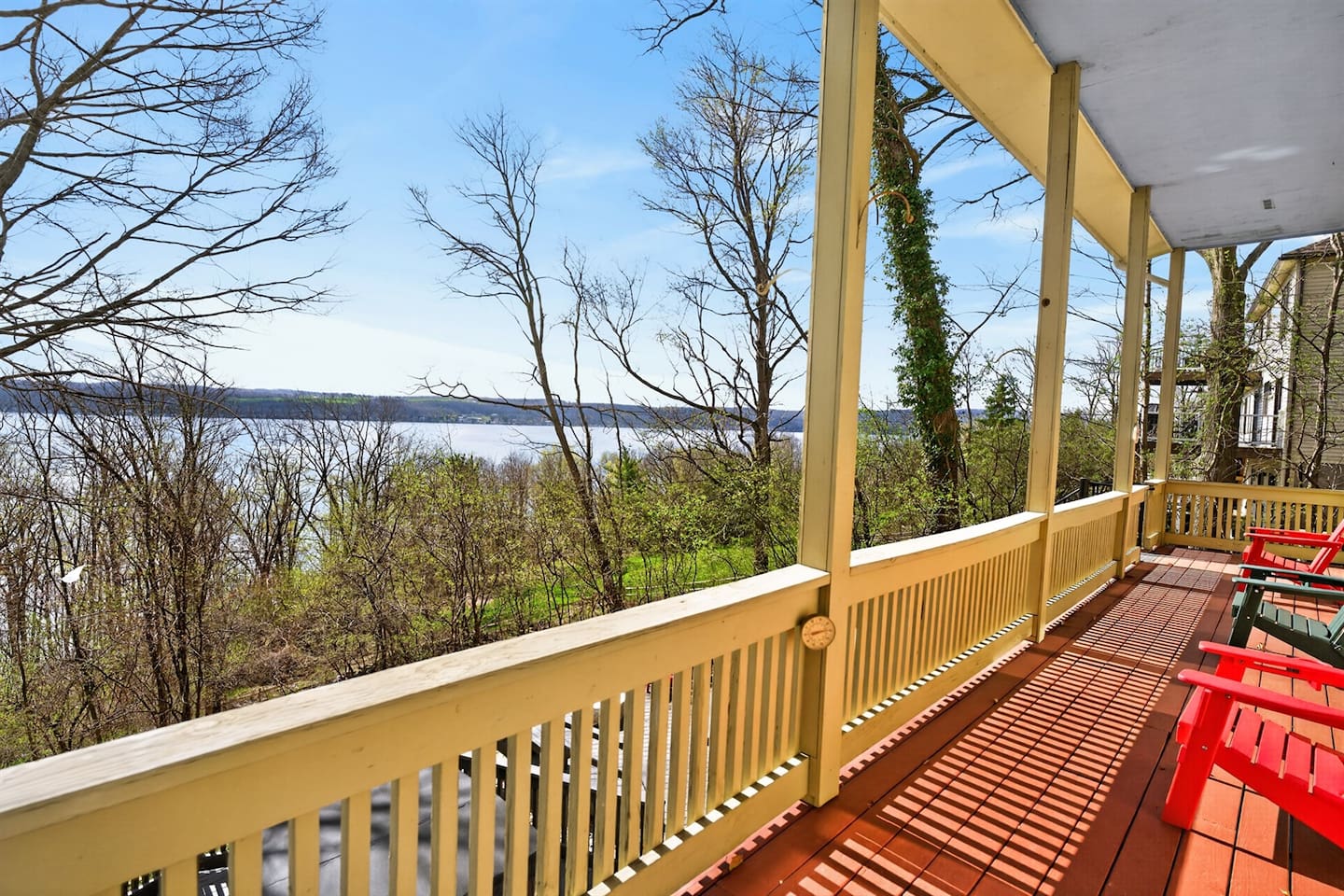Spacious porch with sweeping lake views—perfect for morning coffee, sunset relaxation, and peaceful moments in nature.