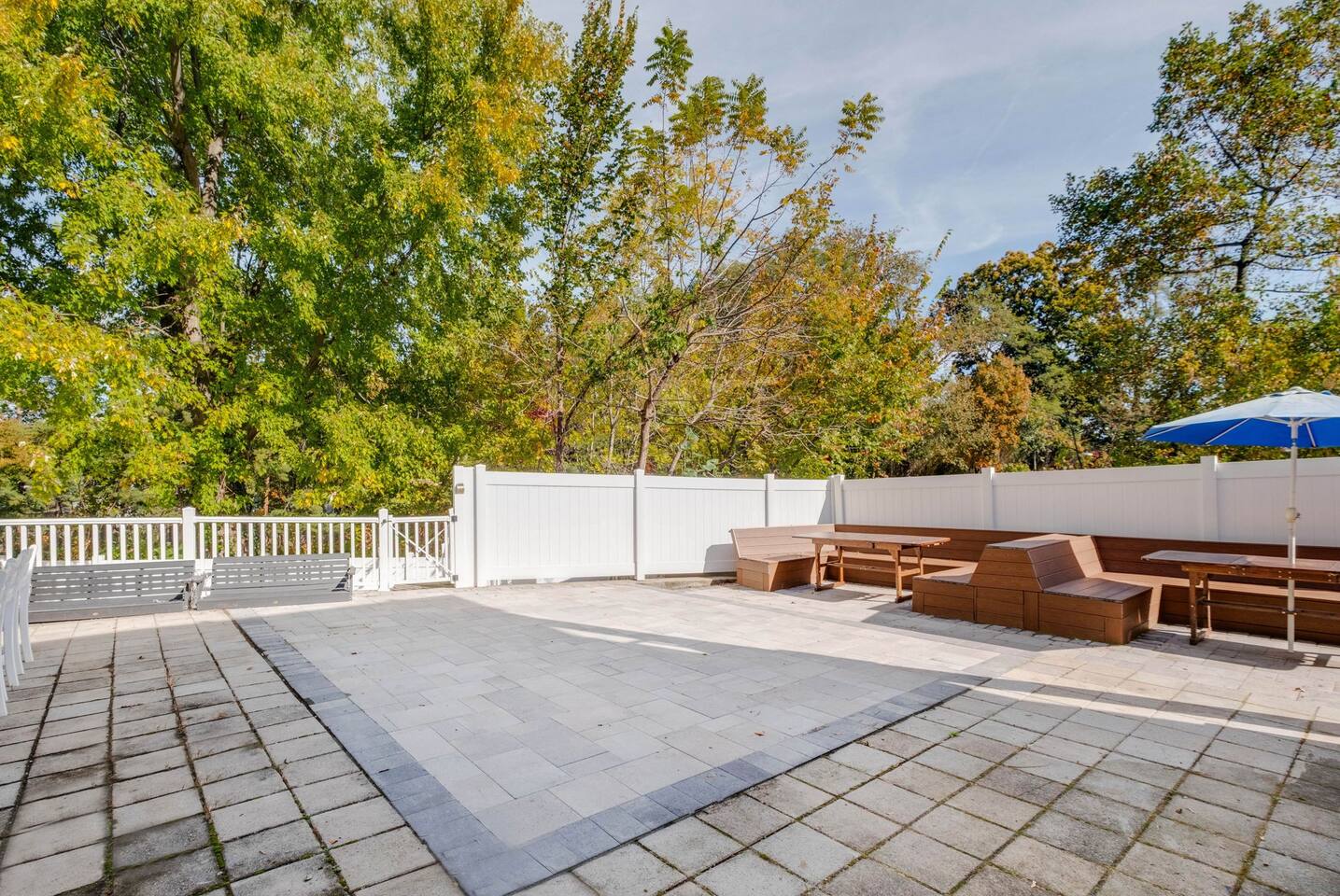 Backyard with the calm of trees and open skies. Close to the city, but space for fresh air as well.