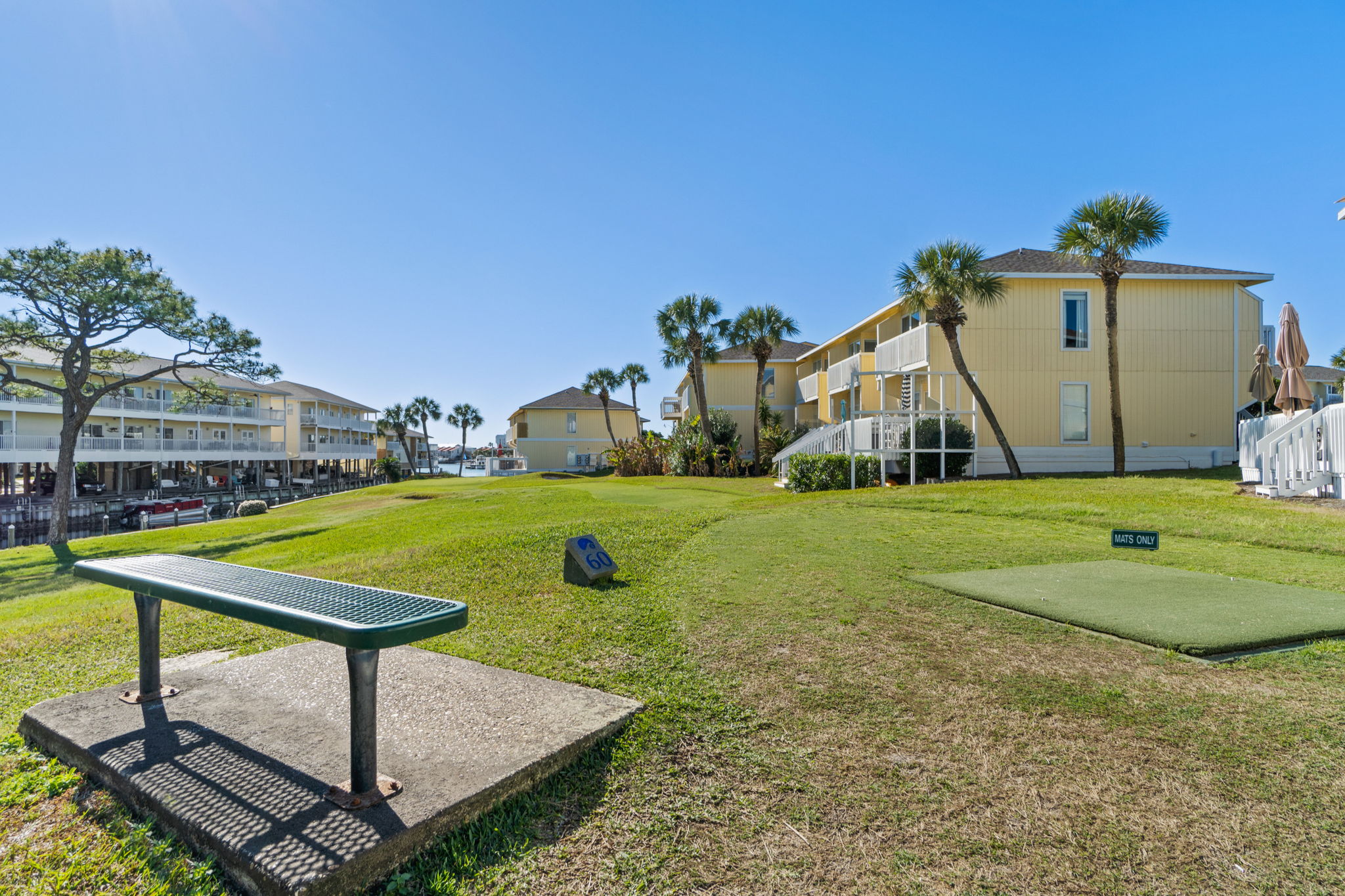 Your front-row seat to resort life. ✨ Relax, recharge, and enjoy the beautiful tropical landscaping from our community seating areas.