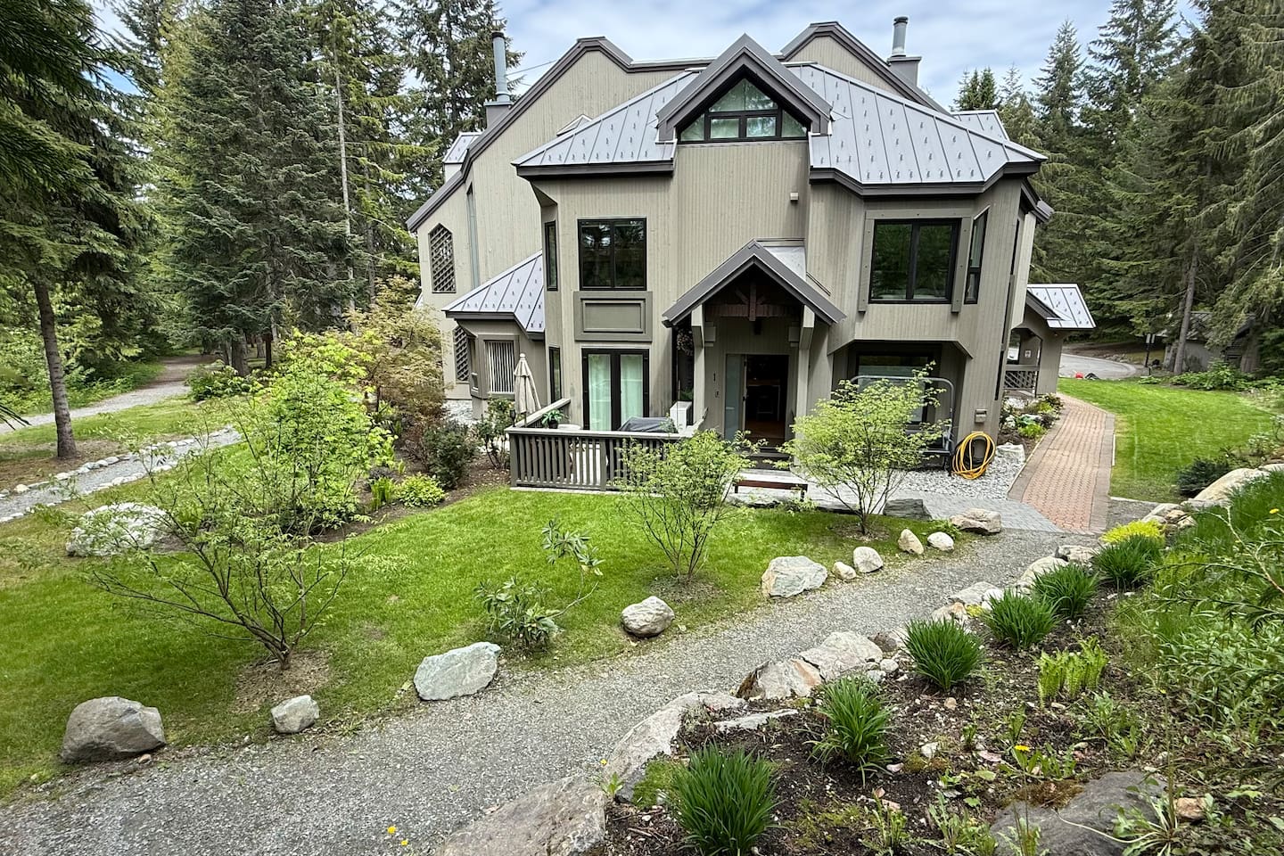 Entire end unit townhome with enclosed gated area + a big beautiful lawn and treed common area.  A gravel walking path outlines the entire property. 