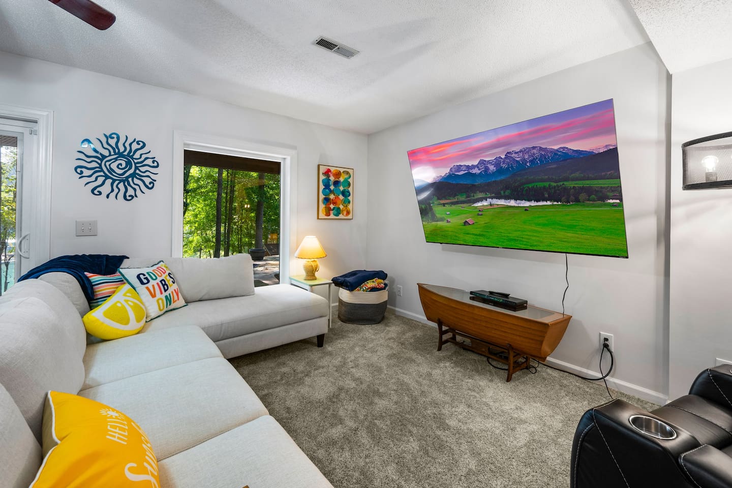 2nd living room located downstairs Infinity Game TableFlat Screen TvPlush Sectional 