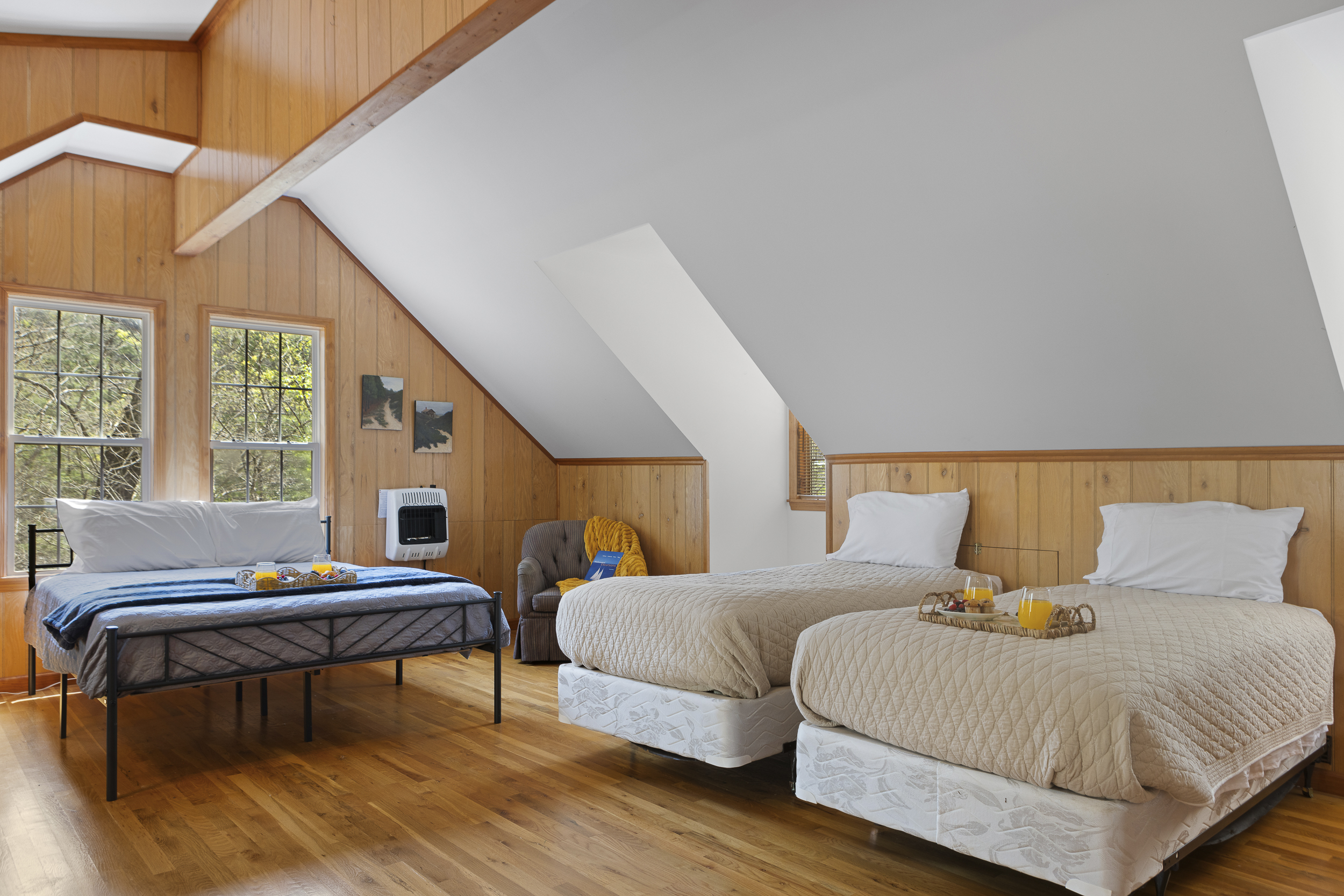 Queen Bedroom 3: Bright, airy loft with panoramic views and delightful decor awaits your stay!