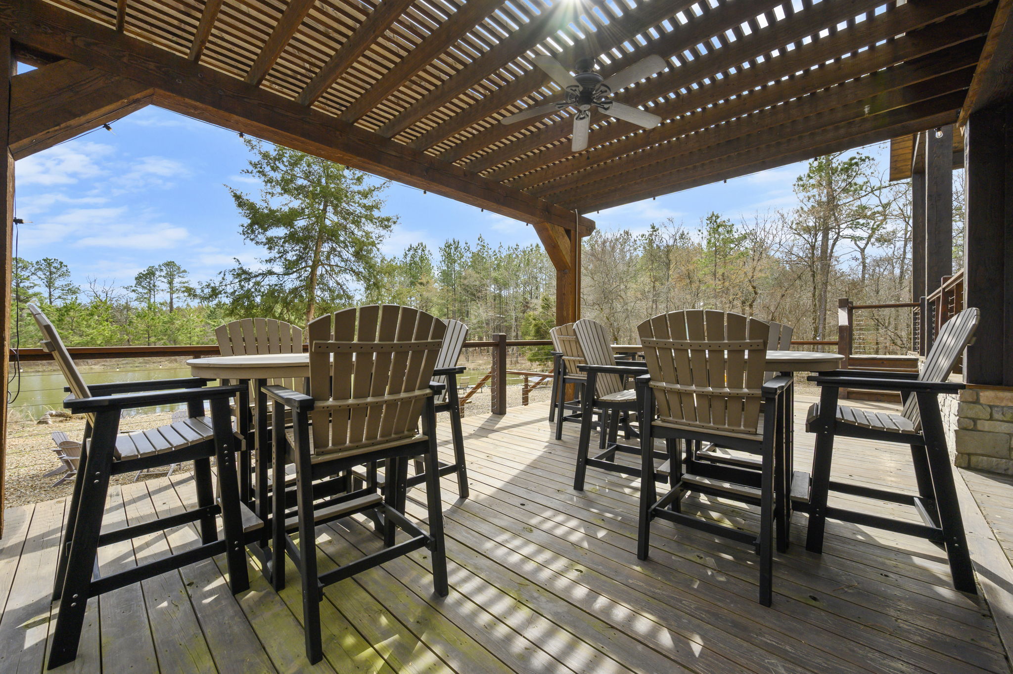 Al fresco dining, fireside stories, and peaceful pond scenery—this is outdoor living perfected.