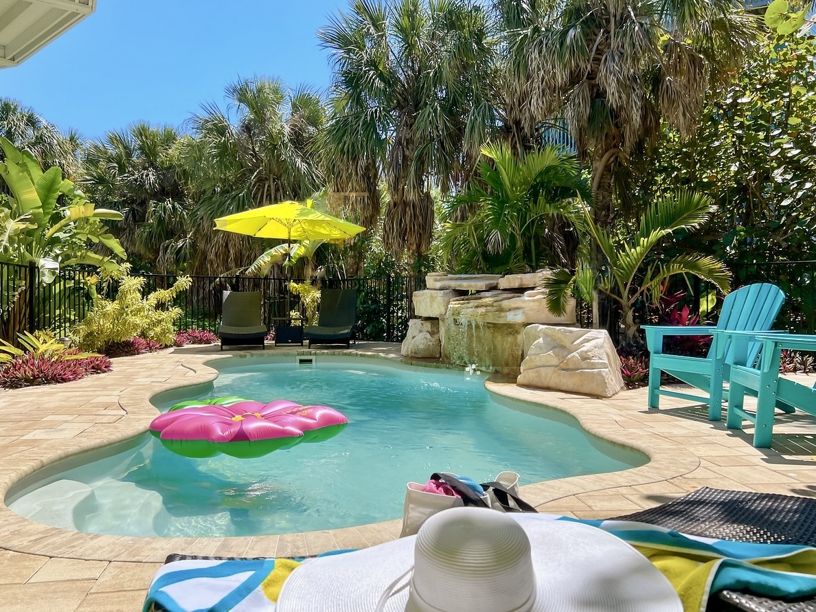 The heated pool with waterfall is as refreshing as it is serene.
