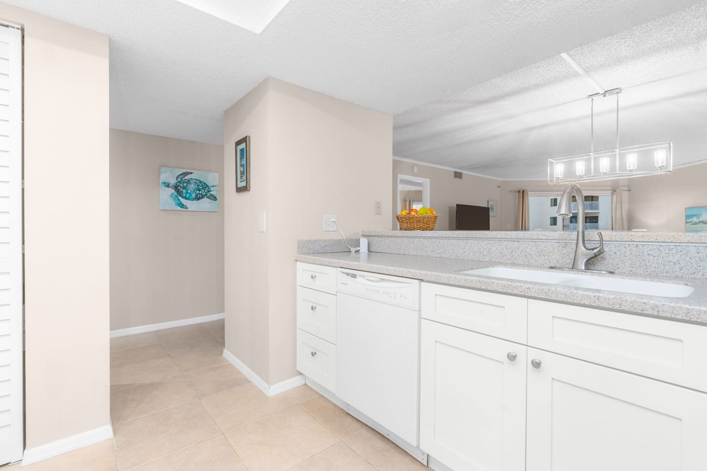 Fully stocked custom kitchen open to the living room. 