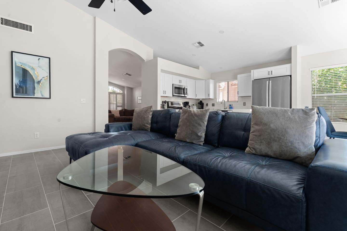 The living room is spacious, comfortable and a great place for everyone to gather.