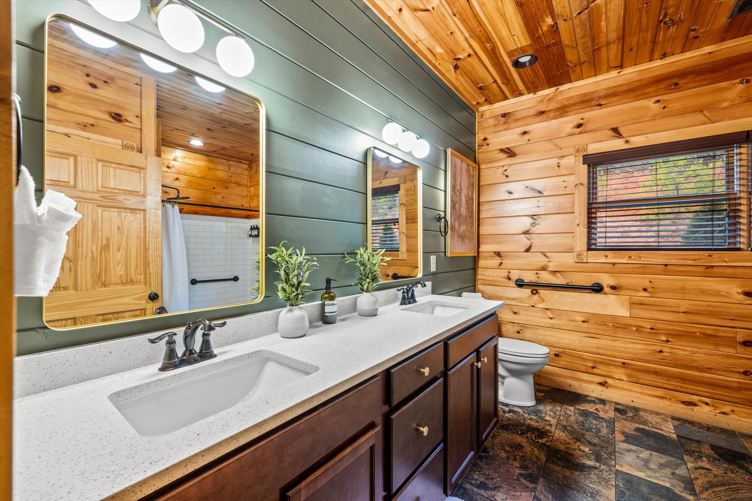 Bedroom 5 has a private bathroom that is also handicap-accessible (has grab bars)