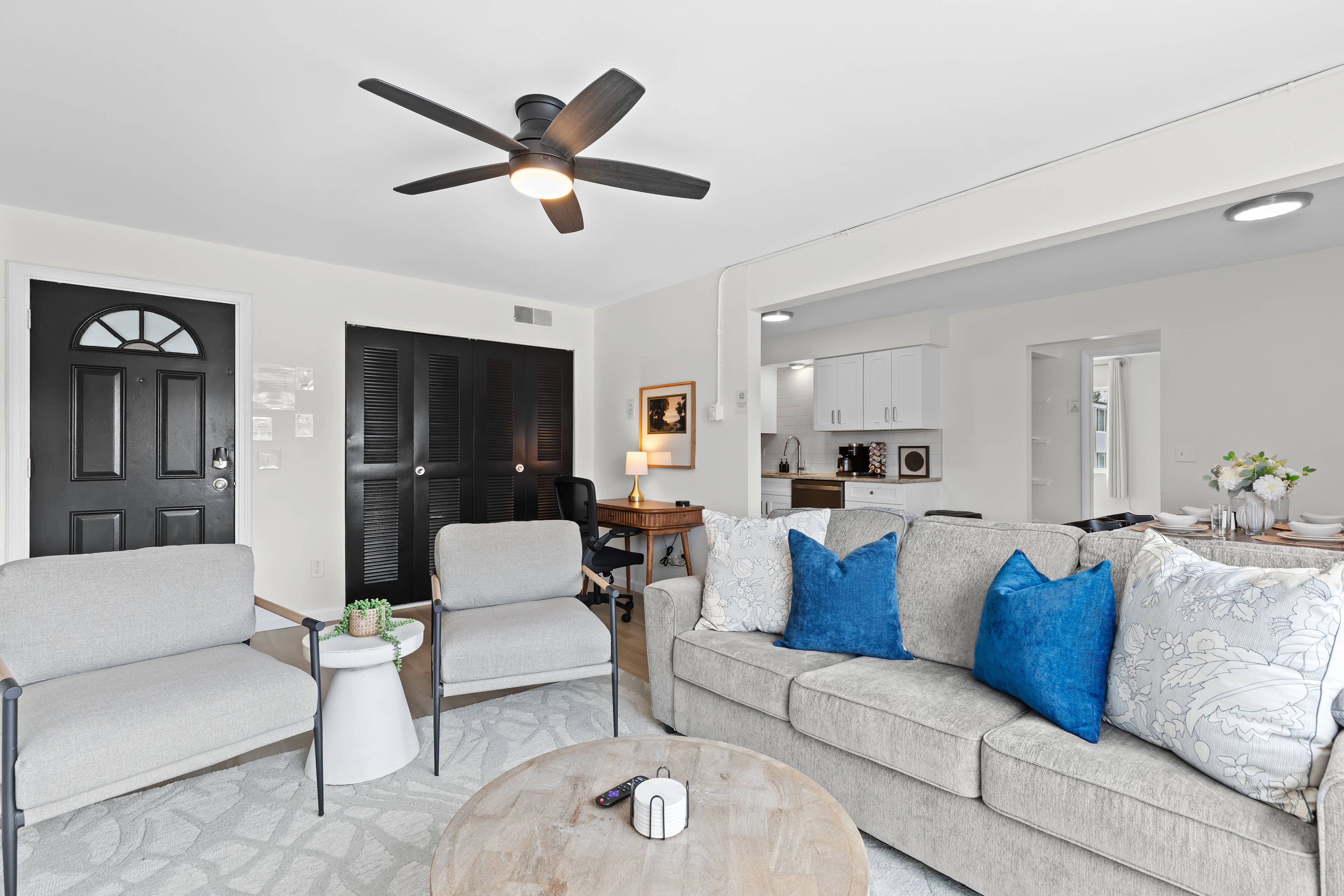 Spacious lounge area with ample seating for conversation and comfort.