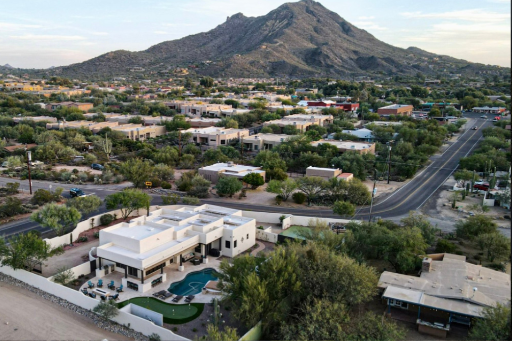 The home is perfectly situated with 365 degrees of mountain views and the street shows the short walk to all the restaurants, bars, live music, shopping in Cave Creek