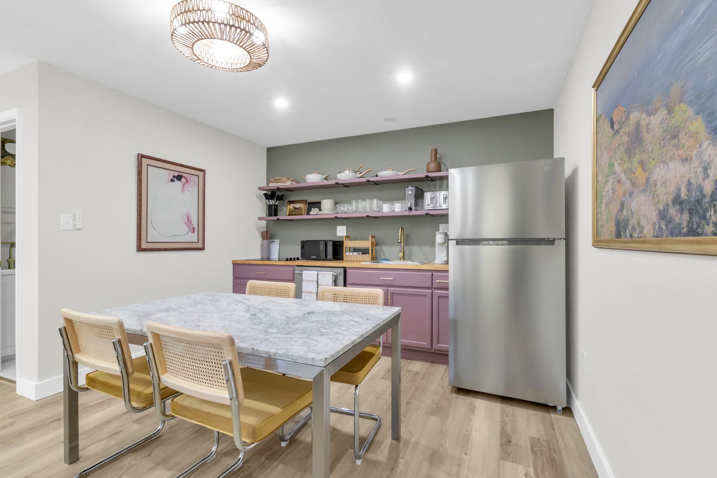 Modern kitchen meets comfort dining; table for four, sleek finishes, and everything you need for effortless meals and gatherings.